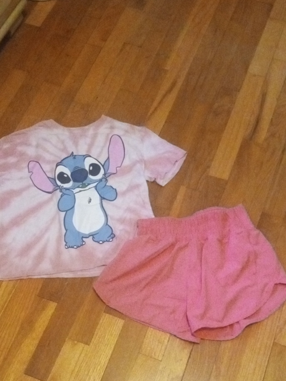 girl xl pink drifit shorts and STITCH tee